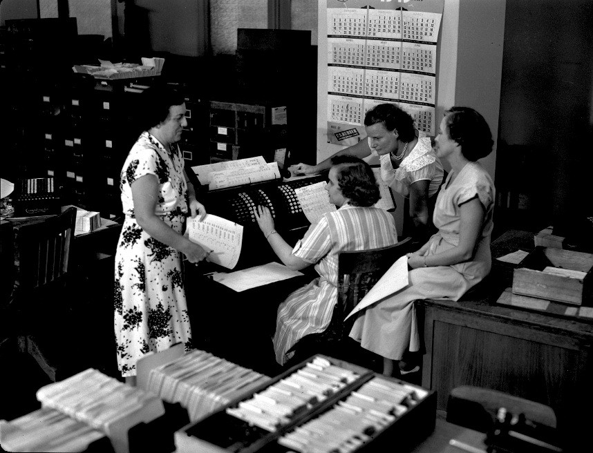 “Women operators at Midvale Company payroll machine in Time Office, April 29, 1949” by Kheel Center, Cornell University