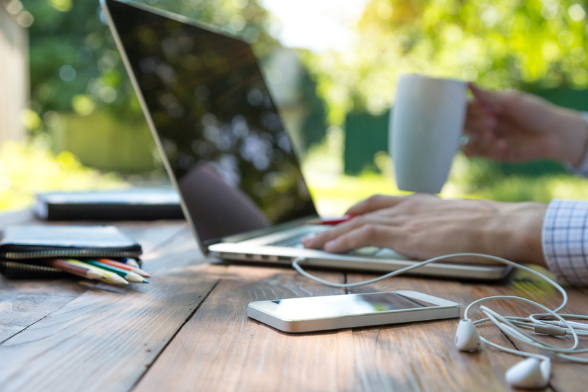 Image of a employee working from home. GMS assists businesses with services like employee performance management.