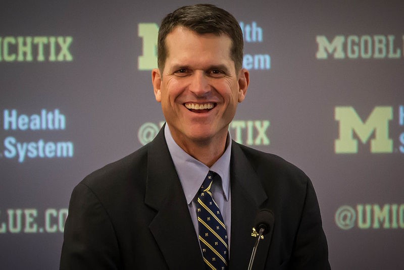 Image of Jim Harbaugh. Contact GMS about unique benefits plans for employees.