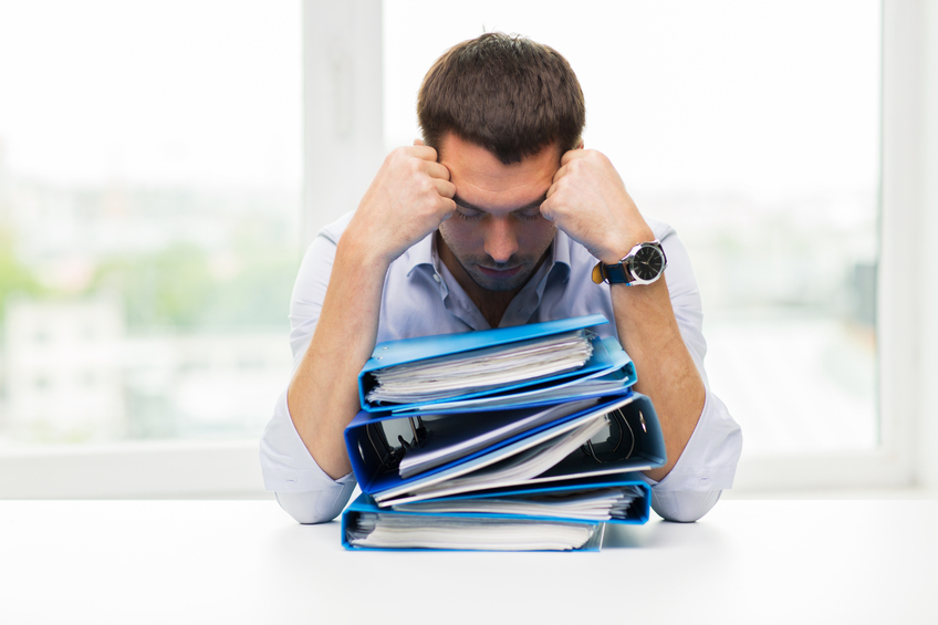Image of a frustrated owner. Human resource audits can help uncover sources of stress and strengthen your business.