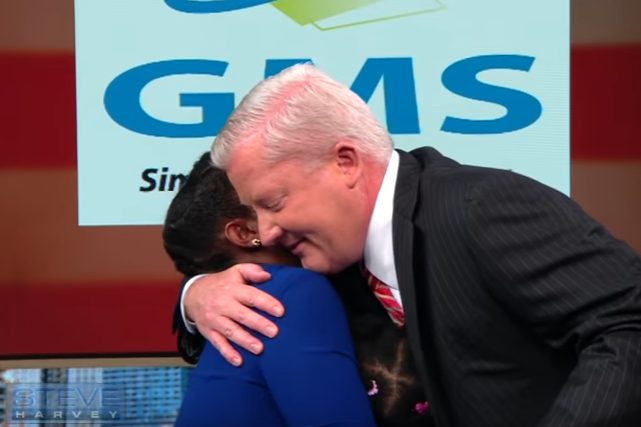 Image of GMS President Mike Kahoe offering a job to Ashley, a Nay veteran, on The Steve Harvey Show.