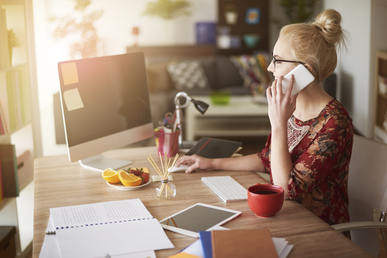 A small business employee working from home.