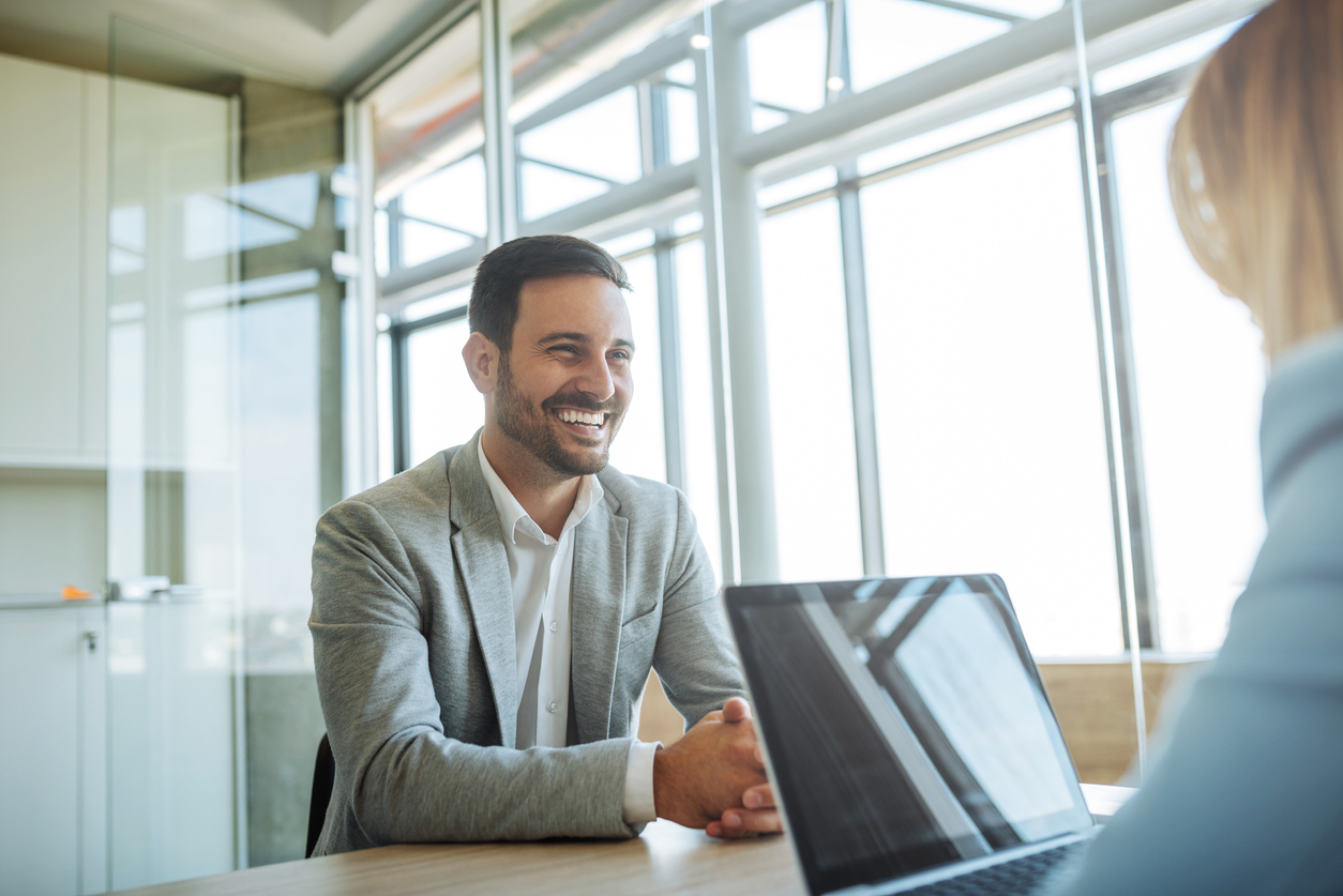 A job applicant being interviewed by a small business following non-discrimatory hiring practices.