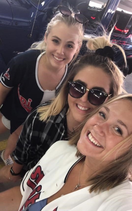 Emily Brock at a Cleveland Indians game with her fellow GMS interns.
