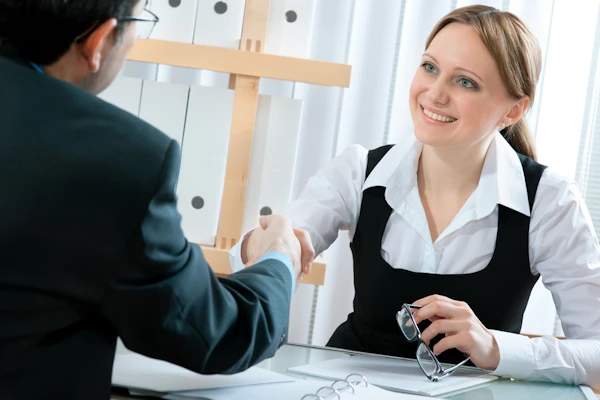 Image of an employee interview. GMS helps businesses with employee retention and hiring decisions.